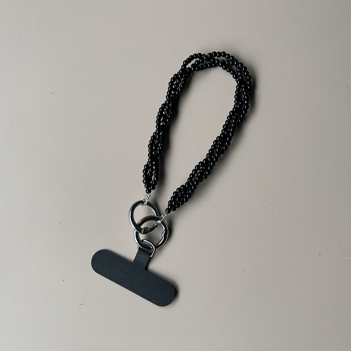 Kim Seybert キムセイベルト　プレイスマット　バーニーズ　ビーズ手仕事 The Beads Weaving Hand Strap】手に馴染む上質感、ビーズ編みのスマホ
